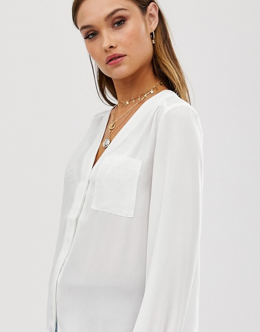 Long sleeve blouse with pocket detail in Ivory